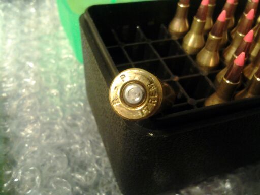 Unfired primer damaged flared firing pin hole.jpg