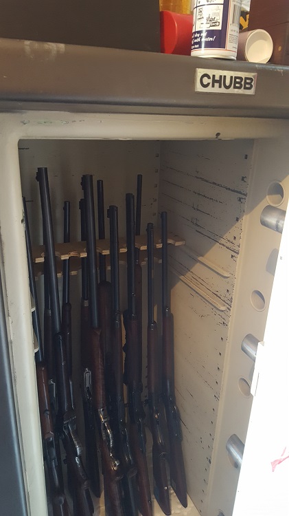 gun racks in chubb safe.jpg